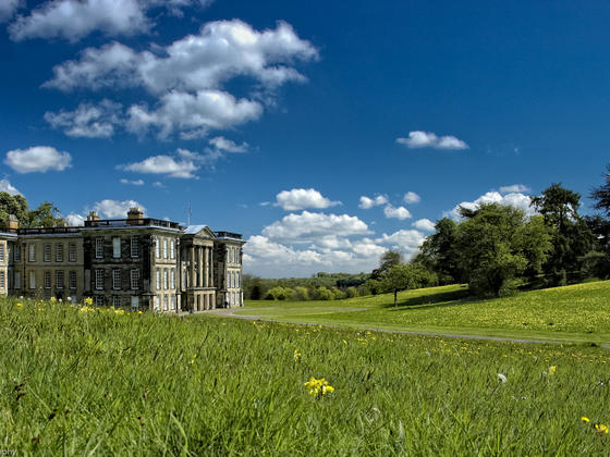 Summer at Calke Abbey with bright blue skies