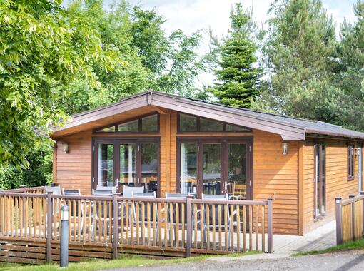 Lodge with path leading to decking area